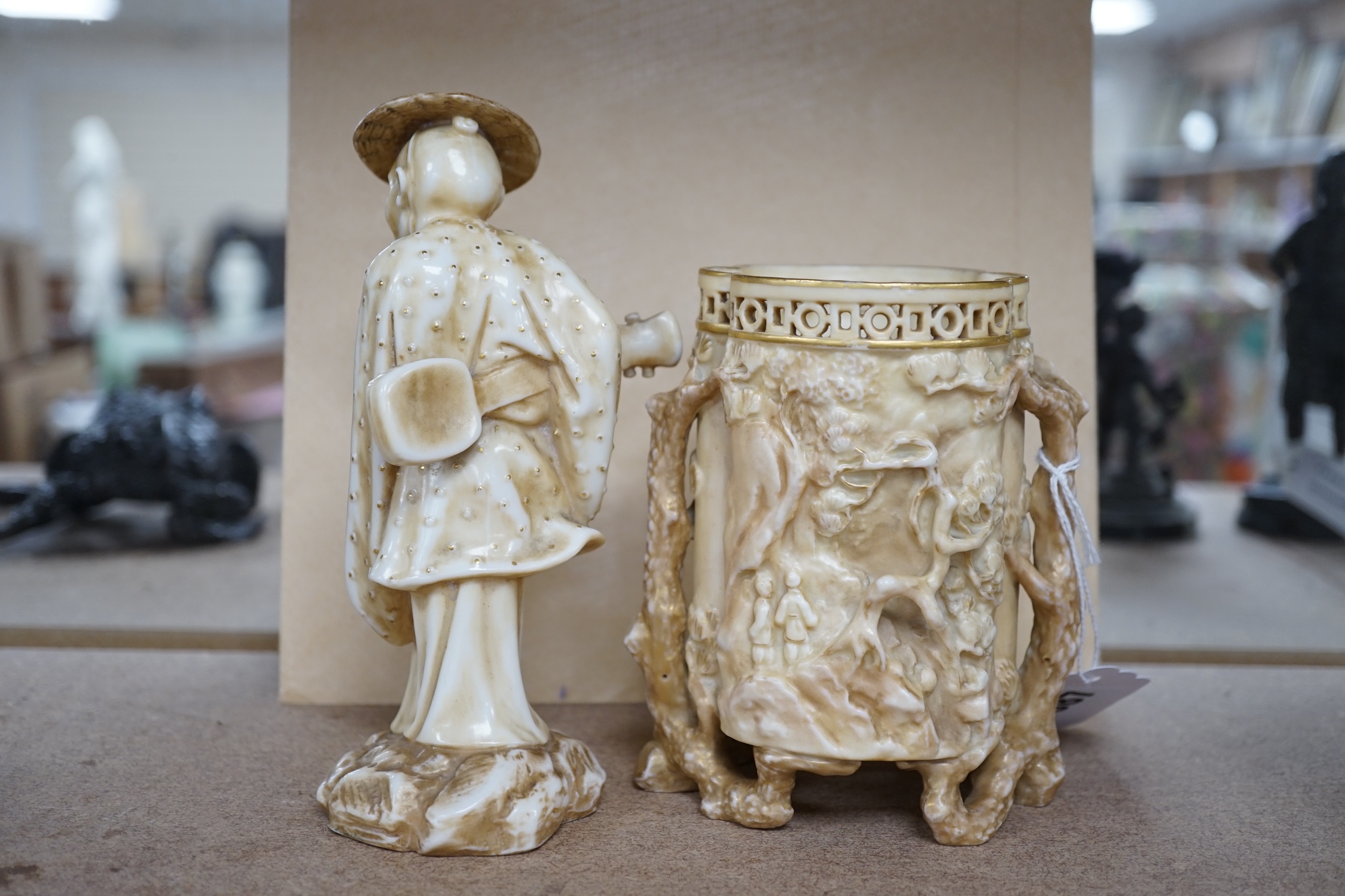 A Royal Worcester ivory ground Chinaman and related jar, tallest 16cm. Condition - worn